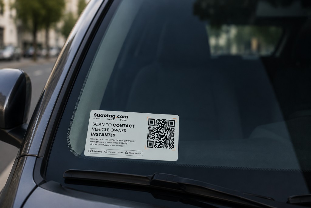 SudoTag sticker on a car windshield — scan to contact the vehicle owner